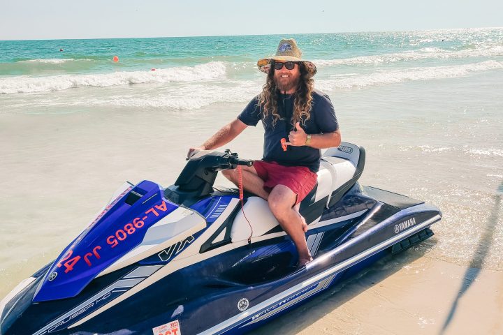 a man sitting on a jet ski